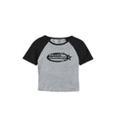 Gray and black women's baby tee shirt with 'Club Cosmos' logo on a white background.