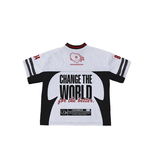 White sports jersey with black sleeves and  typographic design on a white background.