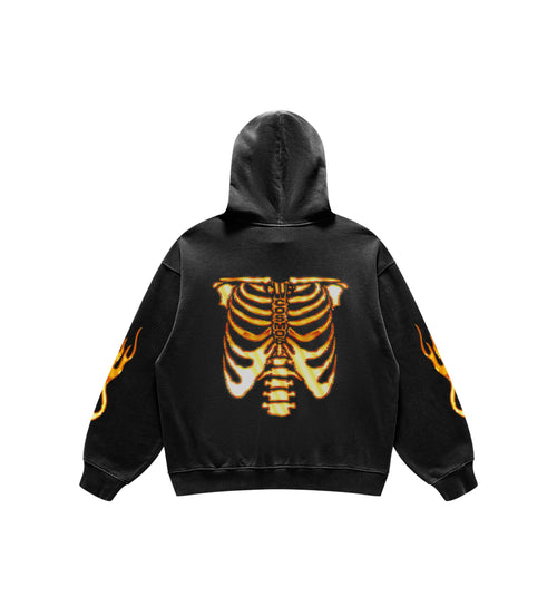 Black hoodie with an orange rib cage skeleton design on the back against a white background.
