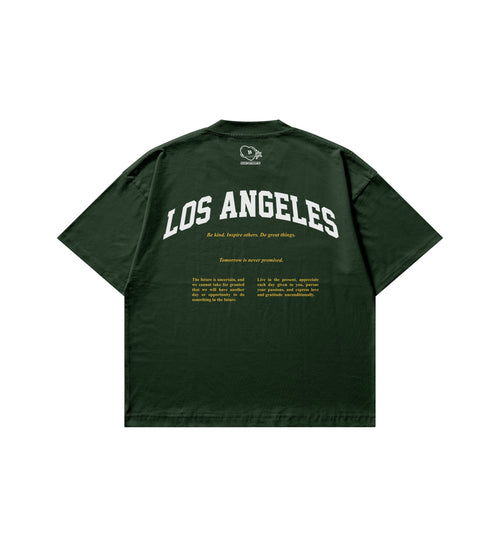 Green t-shirt with 'Los Angeles' text on the back against a white background.
